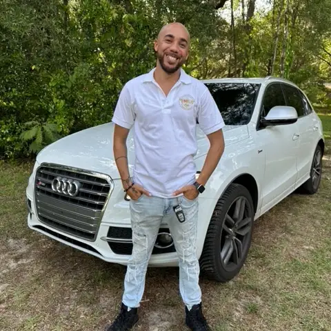 Samuel Rodriguez - In front of a Car Samuel Rodriguez - In front of a Car